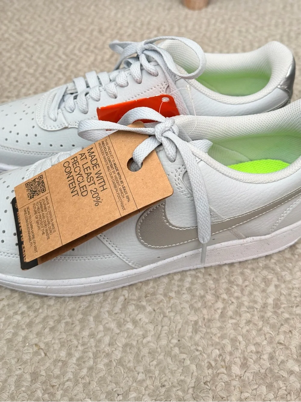 Nike Women’s White Low-Top Sneakers with Neon Green Insole Accent